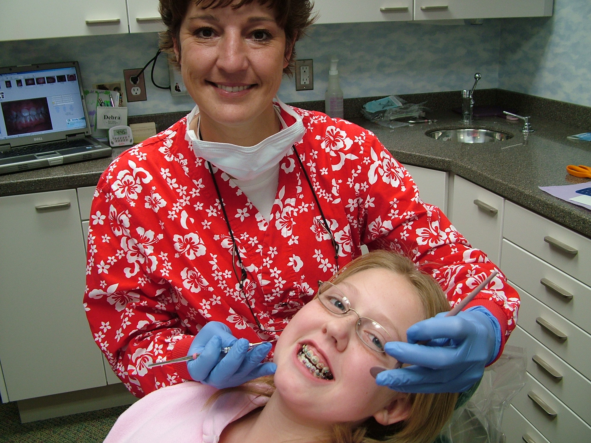 staff member with smailing child